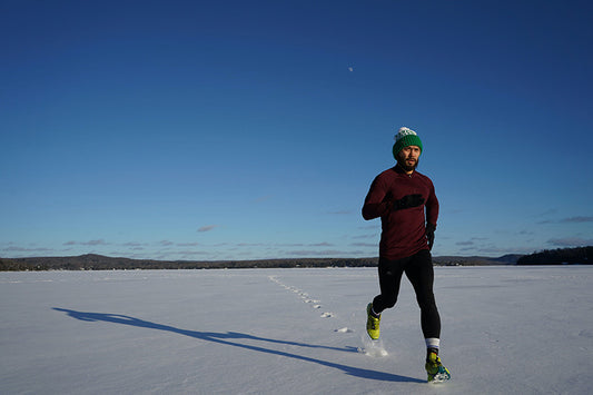 Person running in the snow - By Andre Morgan on Pexels