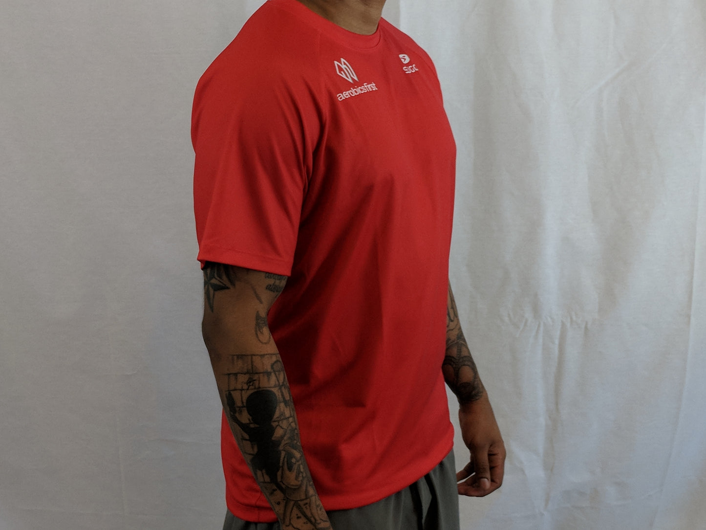 Aerobics First Sugoi Mens Big Logo Turbo Tee