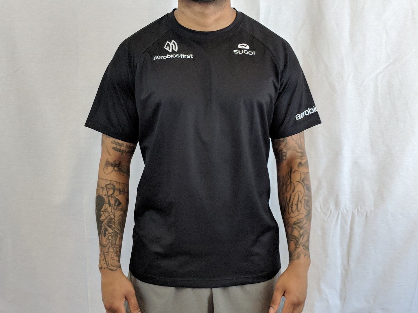 Aerobics First Sugoi Mens Big Logo Turbo Tee