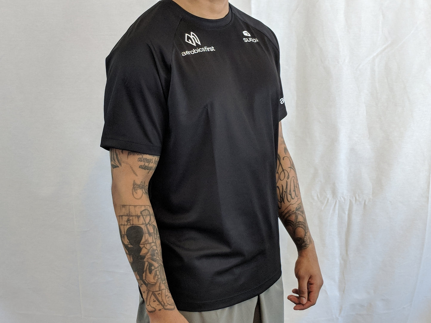 Aerobics First Sugoi Mens Big Logo Turbo Tee