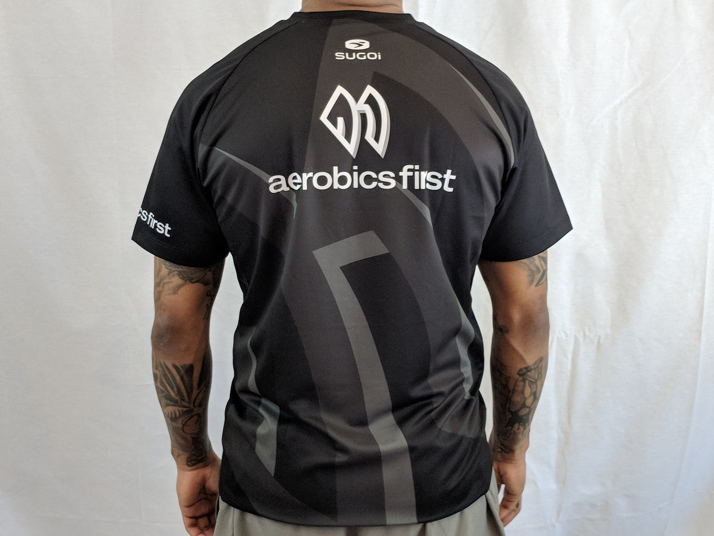 Aerobics First Sugoi Mens Big Logo Turbo Tee